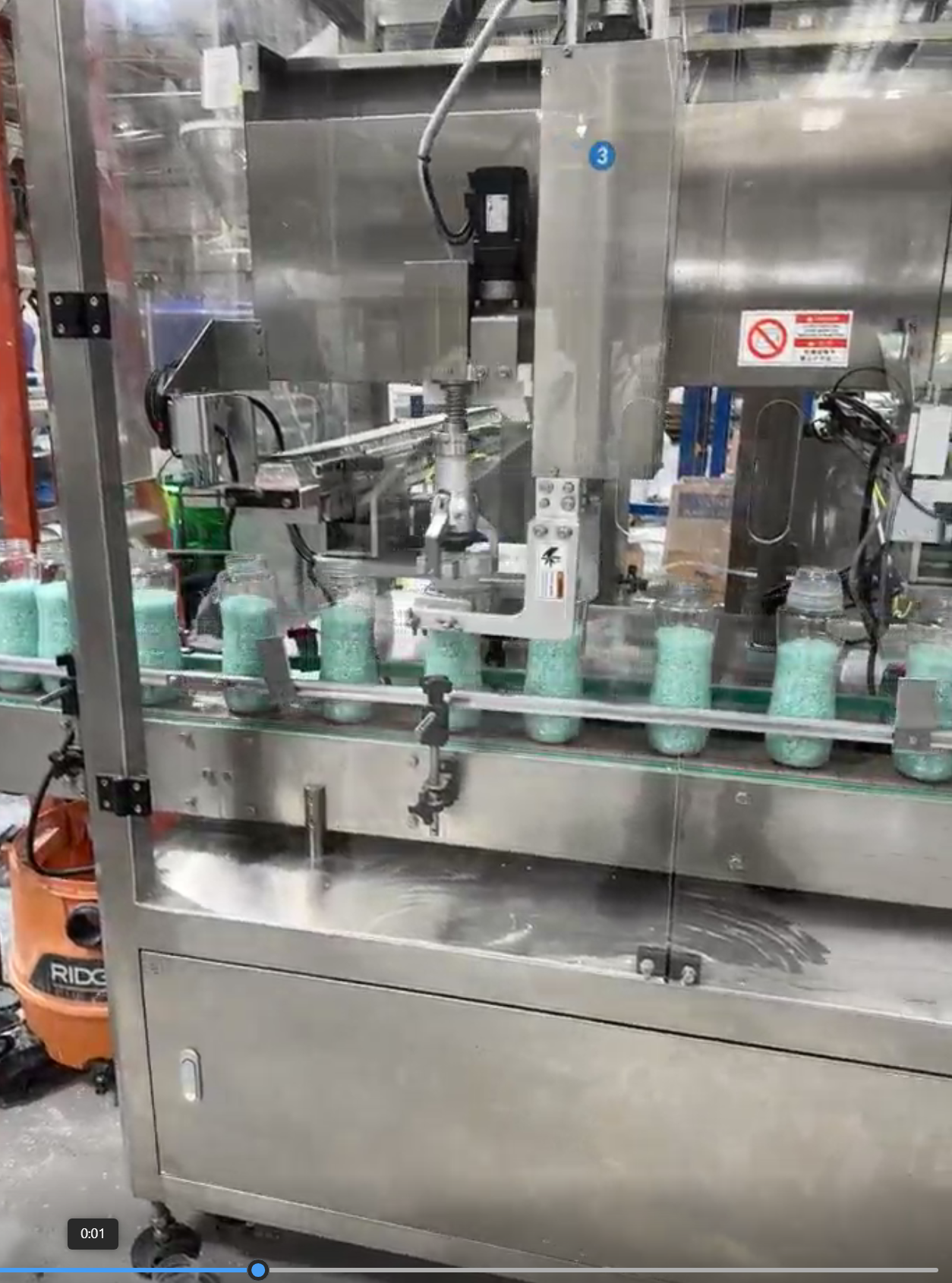 Automated capping machine with robotic bottle tracking